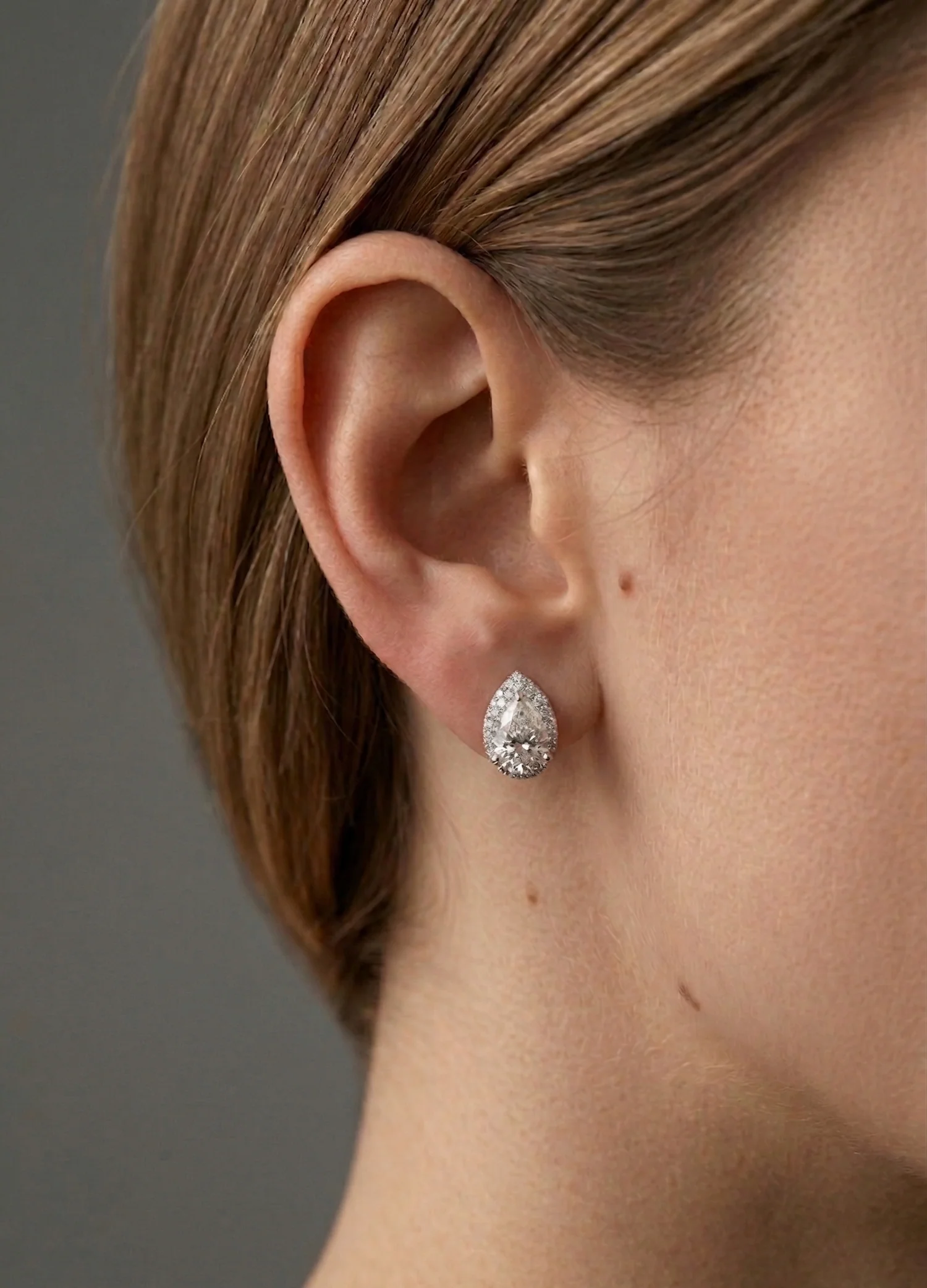 Pear diamond stud earring close-up